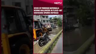 Gujarat Rains Latest | Video Of Foreigners Riding Bulldozer In Flood-Hit Vadodara Sparks Outrage