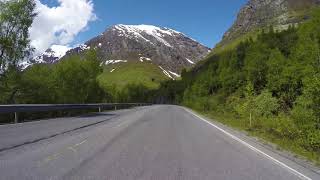 Scenic drive,  point of view, through the snow capped mountain of Norway.