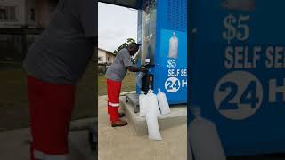 Ice and water vending machine