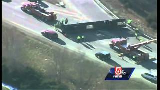 Raw video: Overturned car carrier snarls traffic on I-495