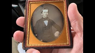 Looking at Two Antique Daguerreotypes