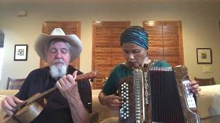 Scott \u0026 Melly playing “Nuevo Laredo” on ukulele and accordion - cover.