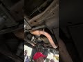 Inspecting truck underneath with quick lecture