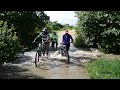 Three Brave Old Cyclists Crossing Flooded River