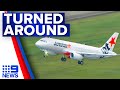 Jetstar apologises to passengers after flight was forced to turn back to Brisbane | 9 News Australia