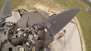 U.S. Army pilot conducts pre-flight checks on a UH-60 Blackhawk