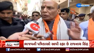 BJP to get majority in Gujarat polls, says Defence Minister Rajnath Singh in Ahmedabad | Zee News