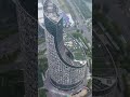 the exterior wall of a skyscraper in anhui is plastered with chinese characters.