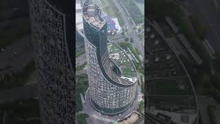 The exterior wall of a skyscraper in Anhui is plastered with Chinese characters.