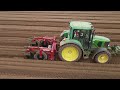 4k massey ferguson valtra and jd tractors planting potatoes with foskett farms in kirton suffolk.