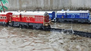 Centy toy trains on parallel tracks | Rajdhani vs shan-e-punjab epic train crossing in heavy rain