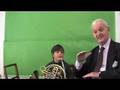 Ifor James explains about children holding the French Horn