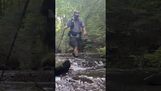 Hiking over slippery rocks