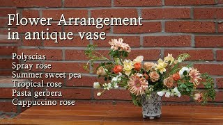 Flower Arrangement in antique vase