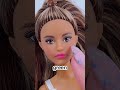 giving barbie 2 different colored eyes