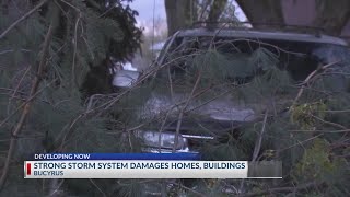 Strong storm system damages homes, buildings