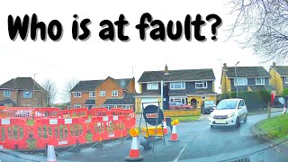 Who is at fault at the temporary traffic lights?