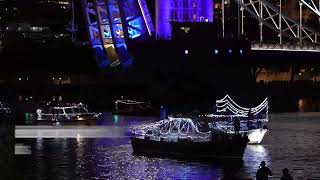 Night time flotilla of over 150 boats marks Queen's death