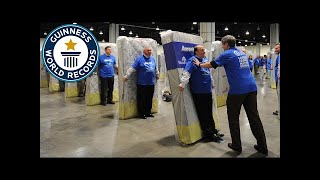 Largest human mattress dominoes - Guinness World Records - VideoStudio