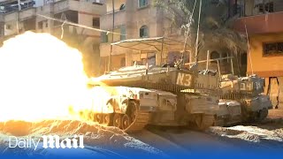 Israeli forces target Hamas with Merkava tanks and rocket launchers during gun battle