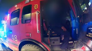 Bodycam footage shows Detroit firefighters at bar and grill with firetruck blocking traffic