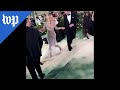 Elle Fanning side steps her way up Met Gala steps