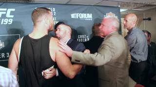 Champ Michael Bisping, Luke Rockhold continue battle after UFC 199 press conference
