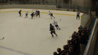 Chris Bressard's shot from the point gets tipped by Cody Marquis vs Northwood