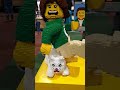 Lego World 2023 Jaarbeurs Utrecht Nederland statue lego figure woman, cat, phone selfie short