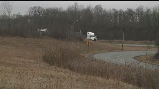 Crews remove semi truck after exit-ramp crash