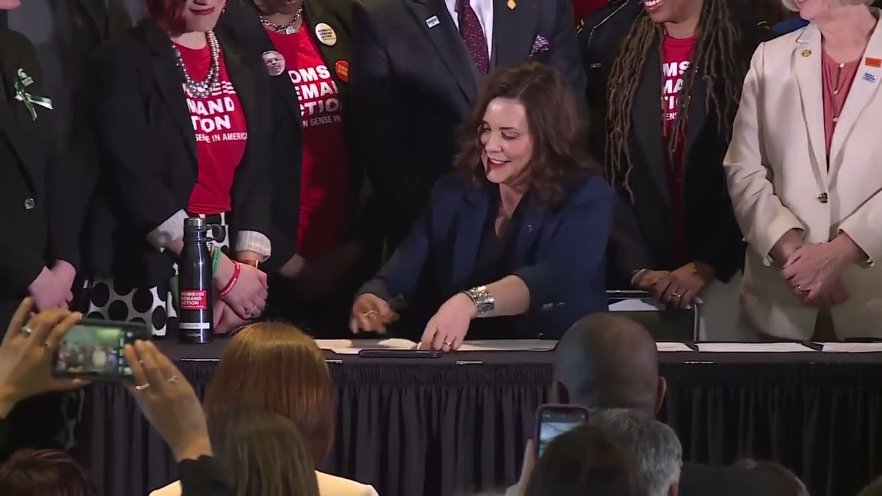 Governor Whitmer Signs New Gun Legislation Into Law - YouTube