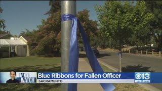 Blue Ribbons Line Neighborhood Where Sacramento Officer Was Shot, Killed