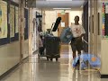 cleaning cart in hallway b