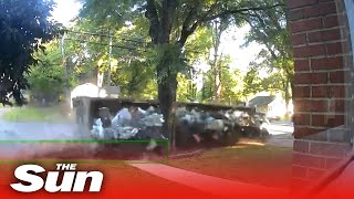 Scrap metal truck flips over and dumps debris in front of North Carolina home