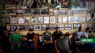 On historic Baghdad street, spirit of music and culture shines