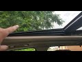 BMW x5 roof problem. roof partially stuck.