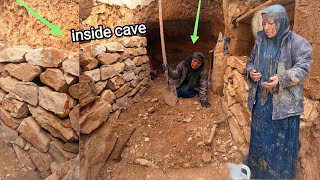 Snowy Mountain Shelter: Grandmother's artist hands trying to expand entrance to cave