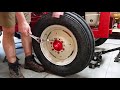 changing the front tire on a ford tractor