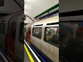 Piccadilly line 1973 Tube stock train arrives at Piccadilly Circus