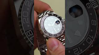 Rolex completed a trinity of black/grey bezelled GMT Master IIs