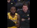 lebron james and luka doncic sitting side by side at the lakers bench 😳