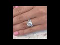 4.2 carat oval moissanite three row band engagement ring