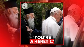 'YOU'RE A HERETIC,' ORTHODOX PRIEST SHOUTS AT POPE IN ATHENS