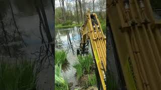 Pond maintenance with cat 302.7cr