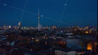 AERIAL: Day to Night Drone Hyper Lapse, Motion Time Lapse over Berlin with Alexanderplatz TV Tower