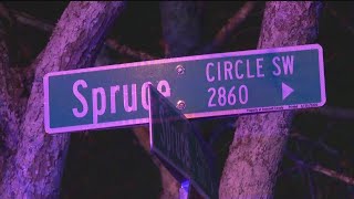 Gwinnett County Police officers investigate a late-night homicide in Snellville