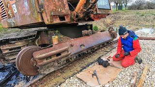 Replacing worn rollers on the excavator