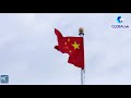 globalink flag raising ceremony at tian anmen square in beijing on national day