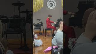 Ivan Shokur  performes at Christmas concert 2024 , Sheremet School of talents