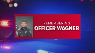 Hundreds escort body of fallen Lorain Officer Phillip Wagner to funeral home as community mourns